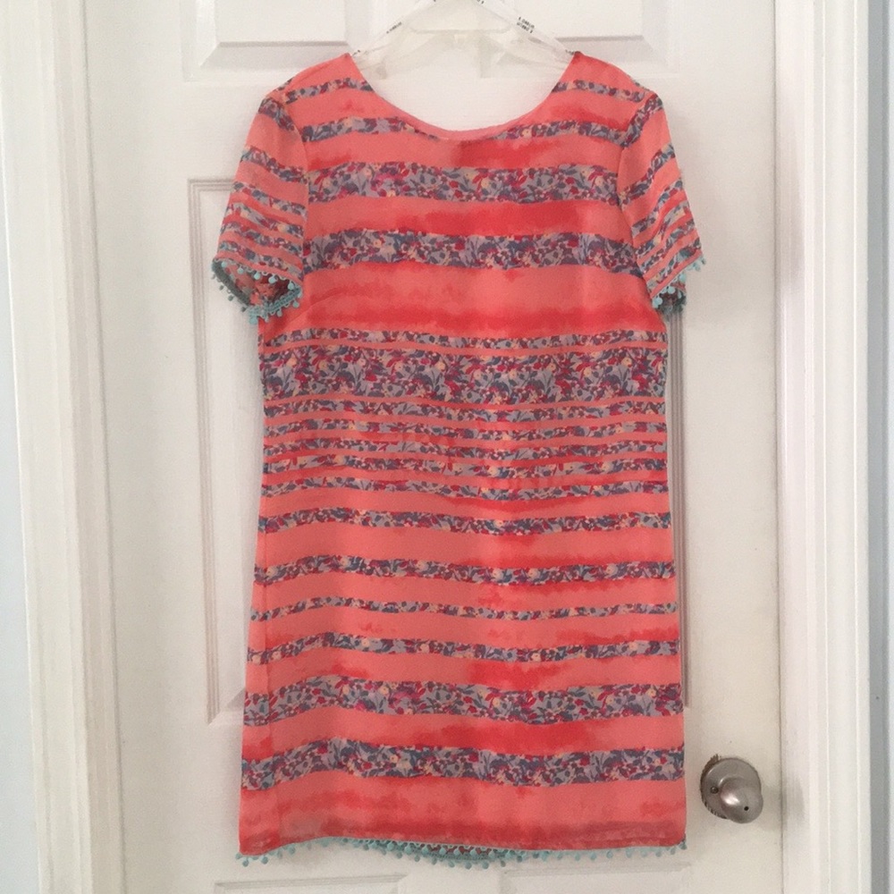 👗#17 Orange & print horizontal dress w/ pom-poms.